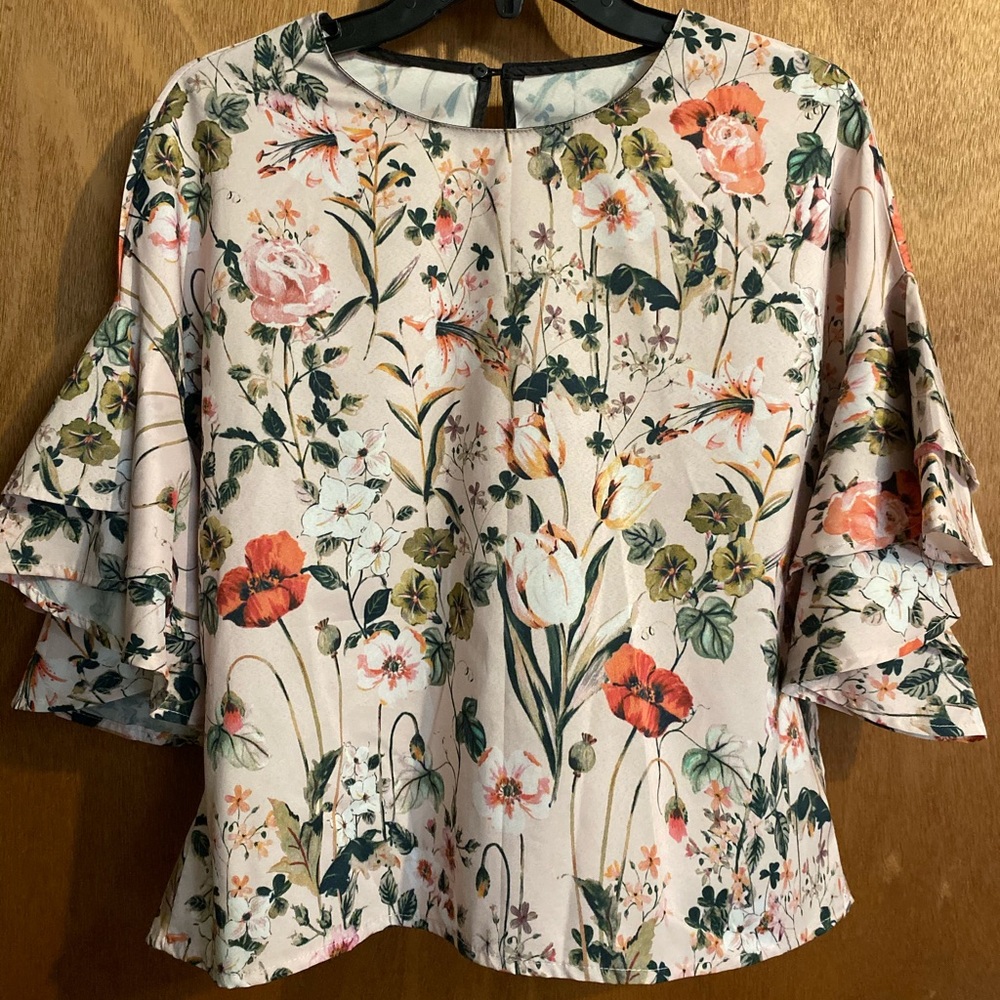 Floral top with bell sleeves